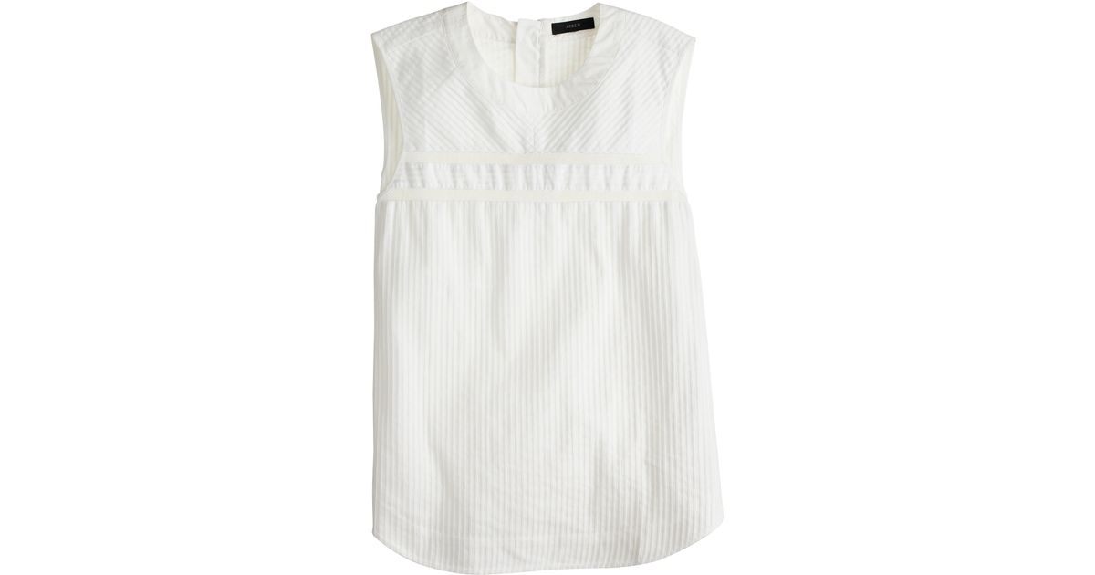 white cotton sleeveless top