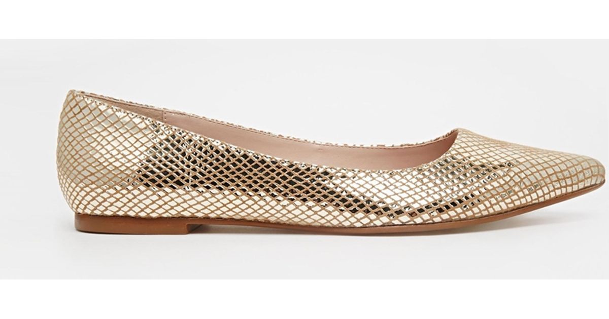 gold flat shoes