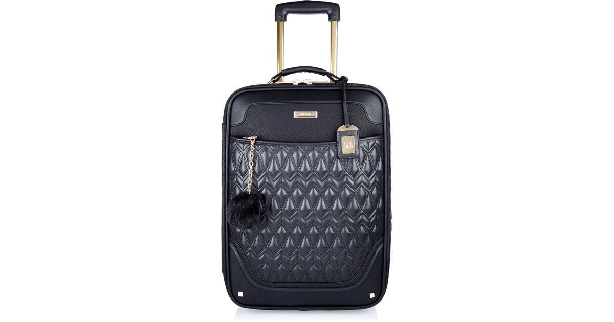 river island luggage