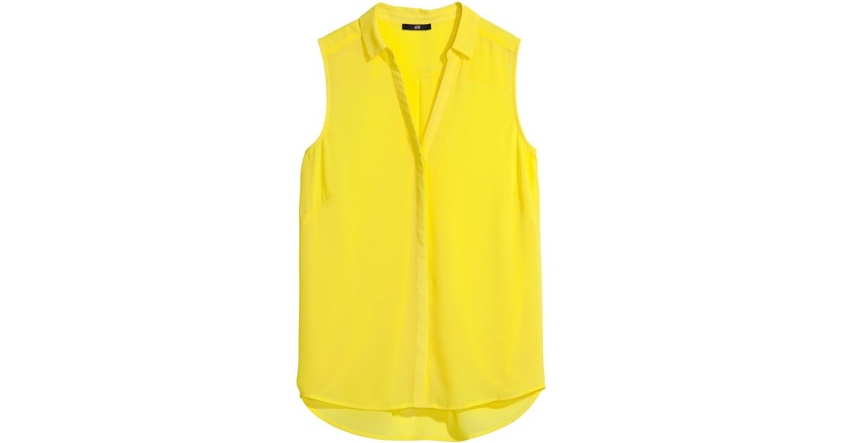 sleeveless yellow blouse