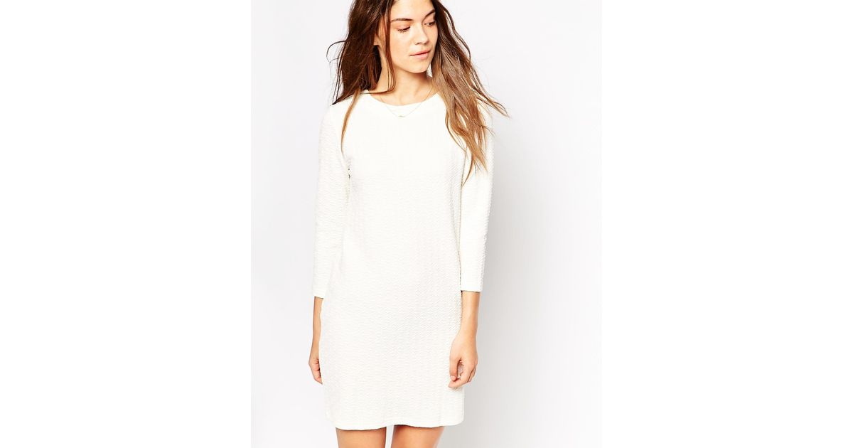 white long sleeve shift dress