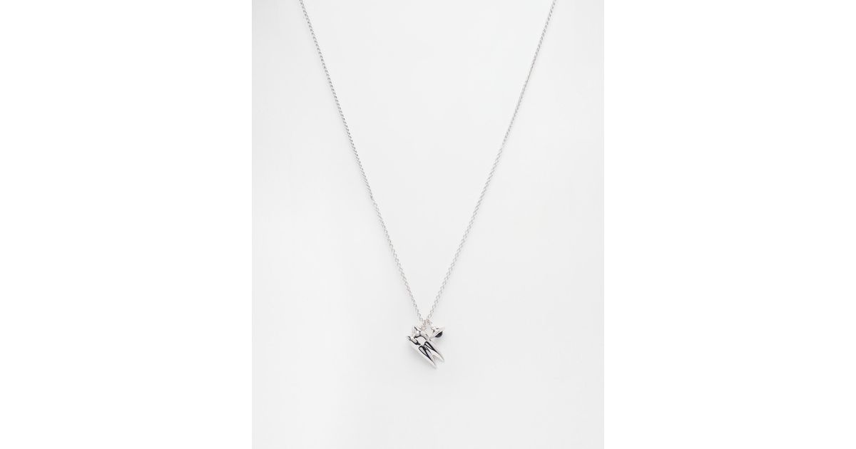 Vivienne westwood discount tooth necklace