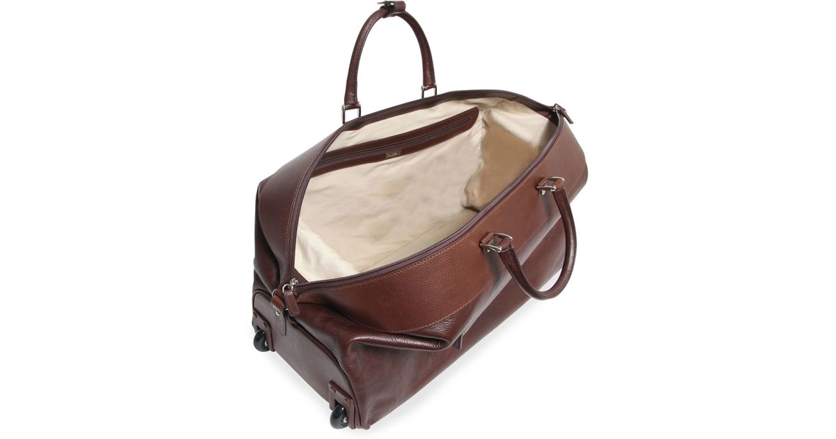 leather carry on bag with wheels
