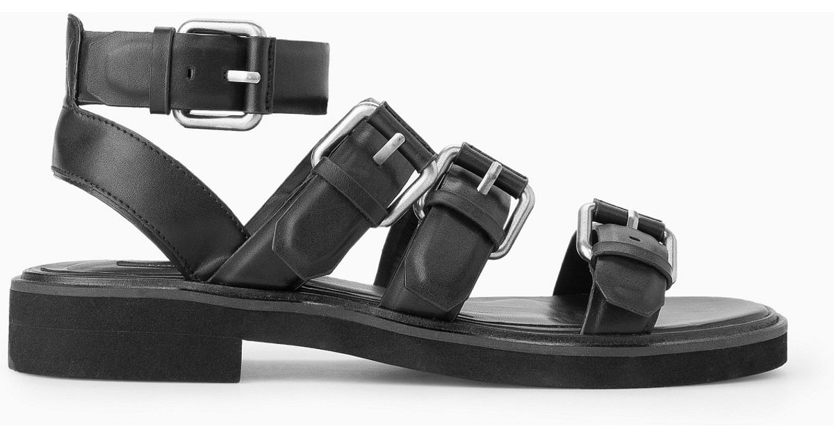 black sandals buckle