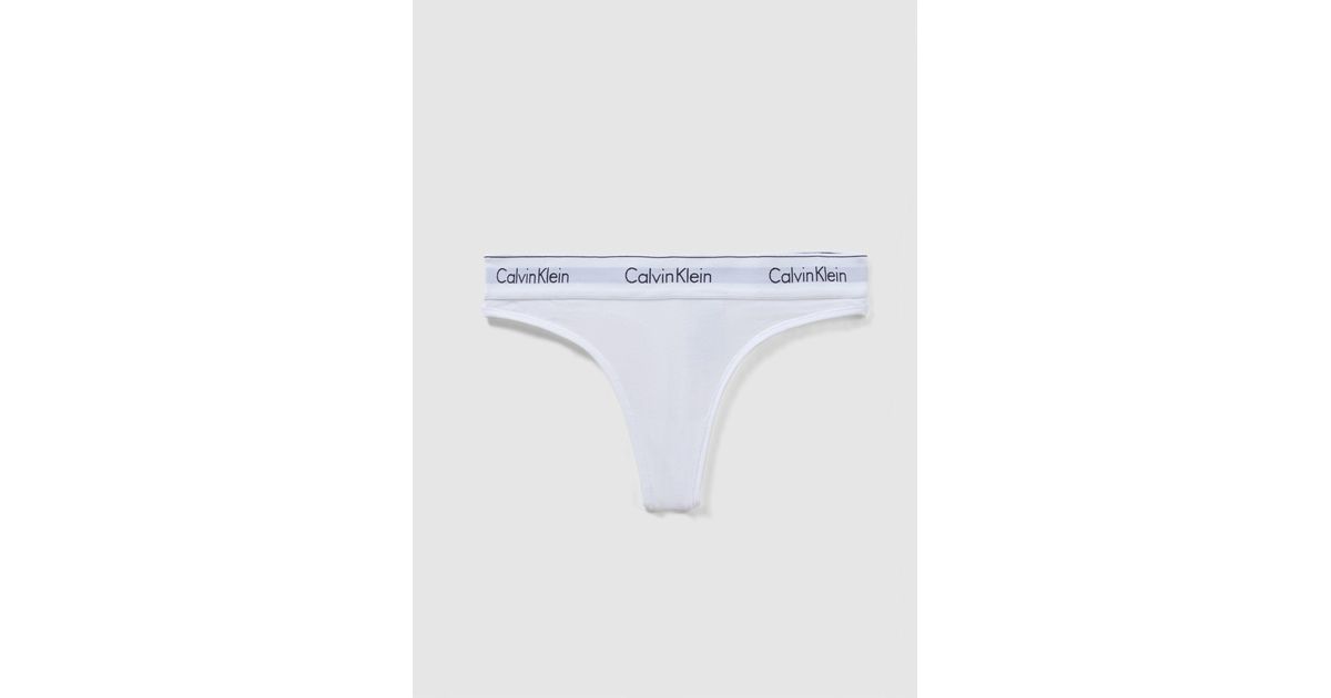 Calvin Klein Underwear Modern Cotton Mid Rise Thong in White | Lyst