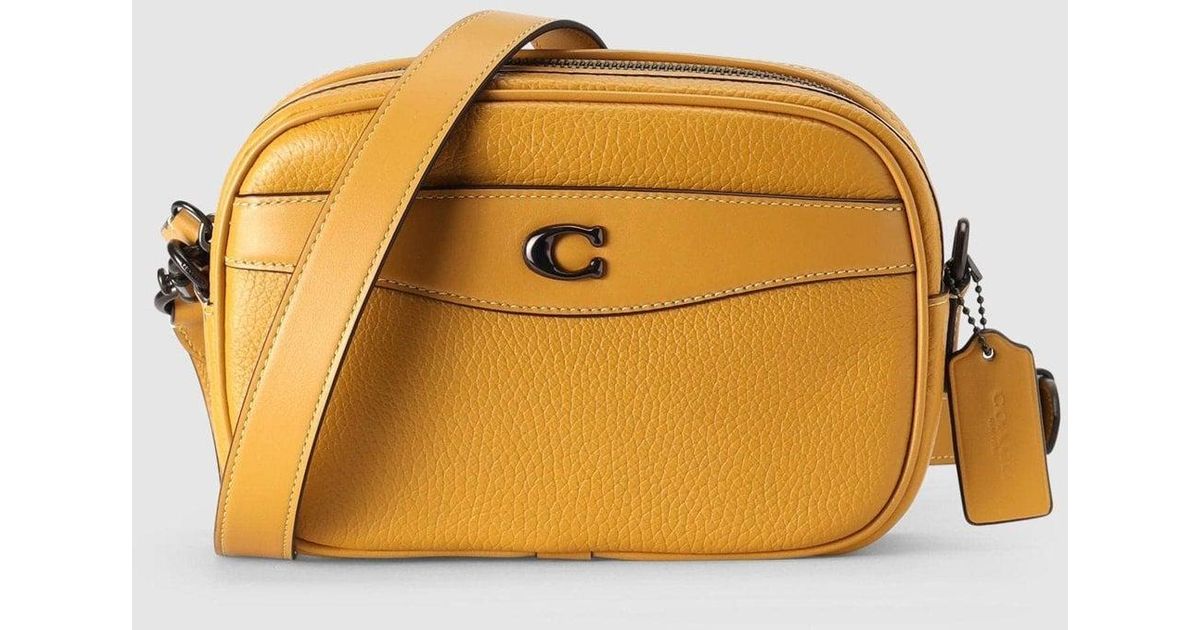 COACH Women's Camera Flax Cross Body Bag in Yellow | Lyst