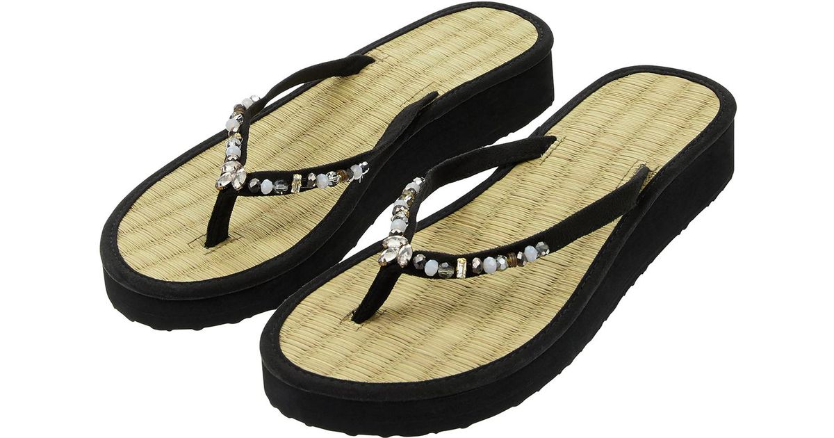 black seagrass flip flops