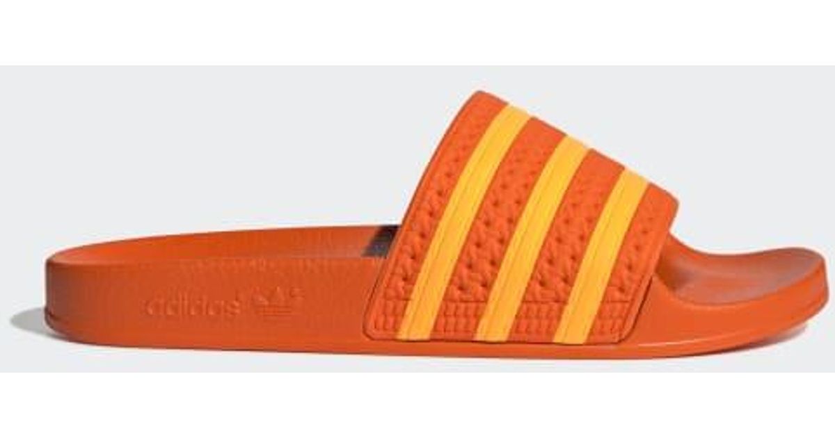 adilette slides orange