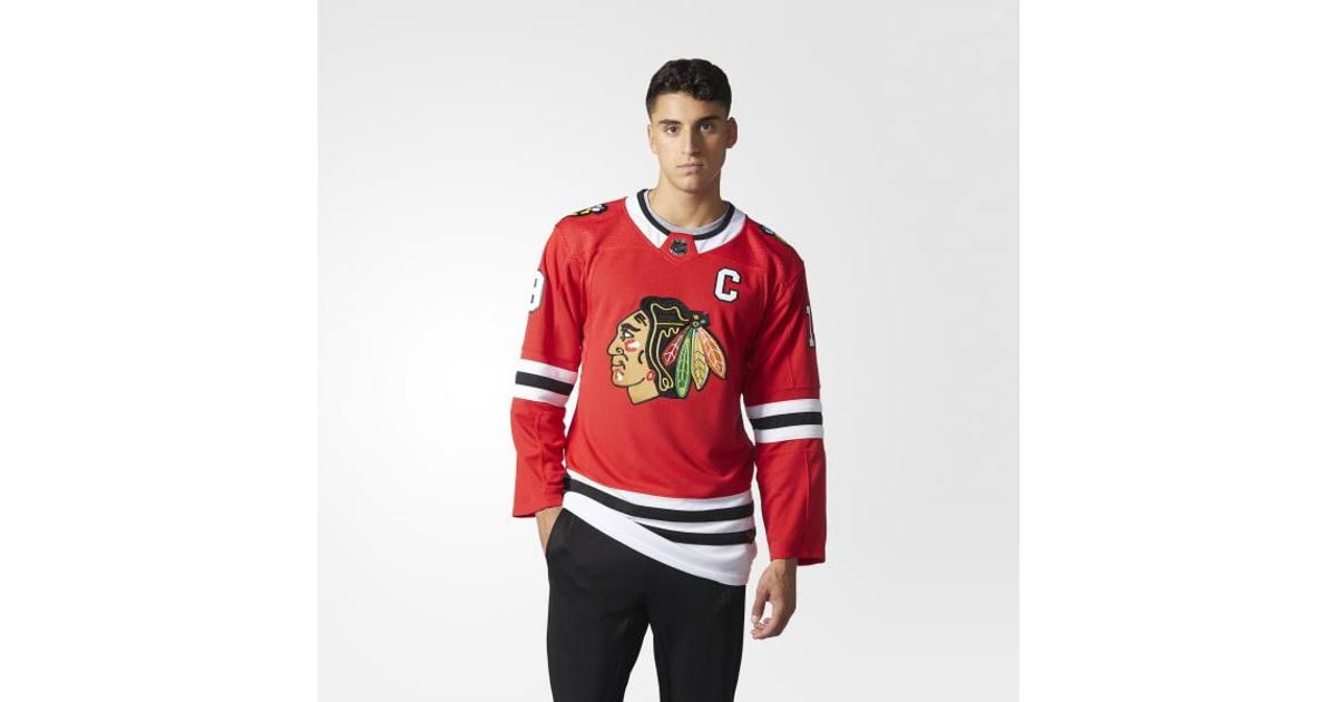 white blackhawks jersey
