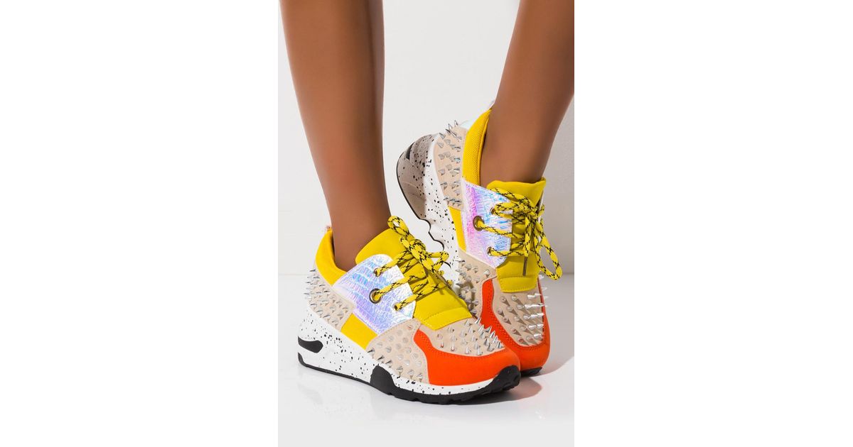 studded tennis shoes