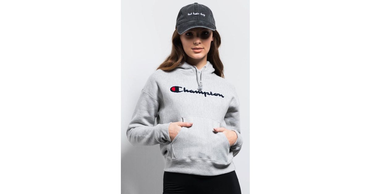 champion reverse weave pullover hoodie with chenille champion script logo