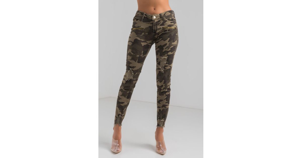 distressed camo skinny jeans