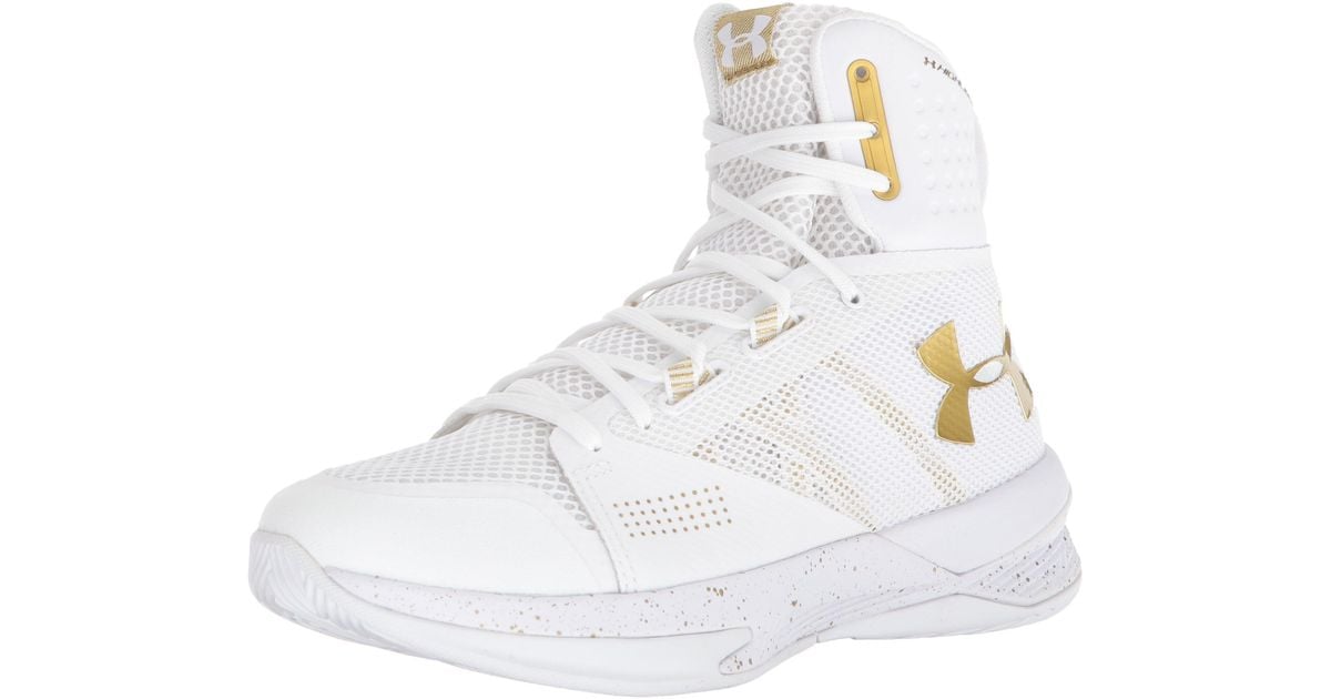 white and gold volleyball shoes