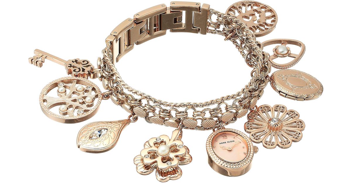 Anne Klein Swarovski Crystal Accented Rose Gold Tone Charm Bracelet Watch In Metallic Lyst Anne Klein Swarovski Crystal Accented Rose Gold Tone Charm Bracelet Watch In Metallic Lyst