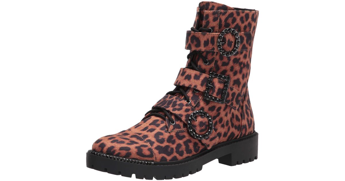 kirlah boot in patent plaid
