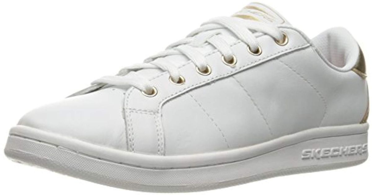 skechers white and gold