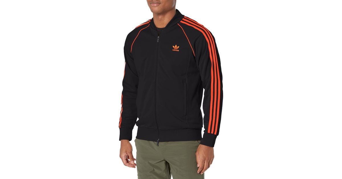 Adidas superstar track top  collegiate orange track tops mens sales