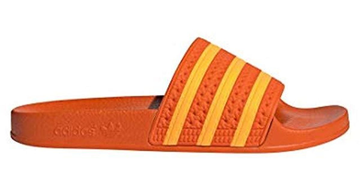 orange adidas slides