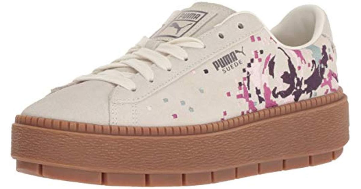 white puma platform trainers
