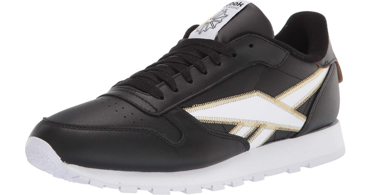 white and black reebok classics