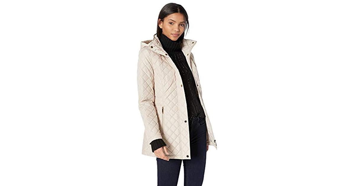 calvin klein women's classic quilted jacket with side tabs