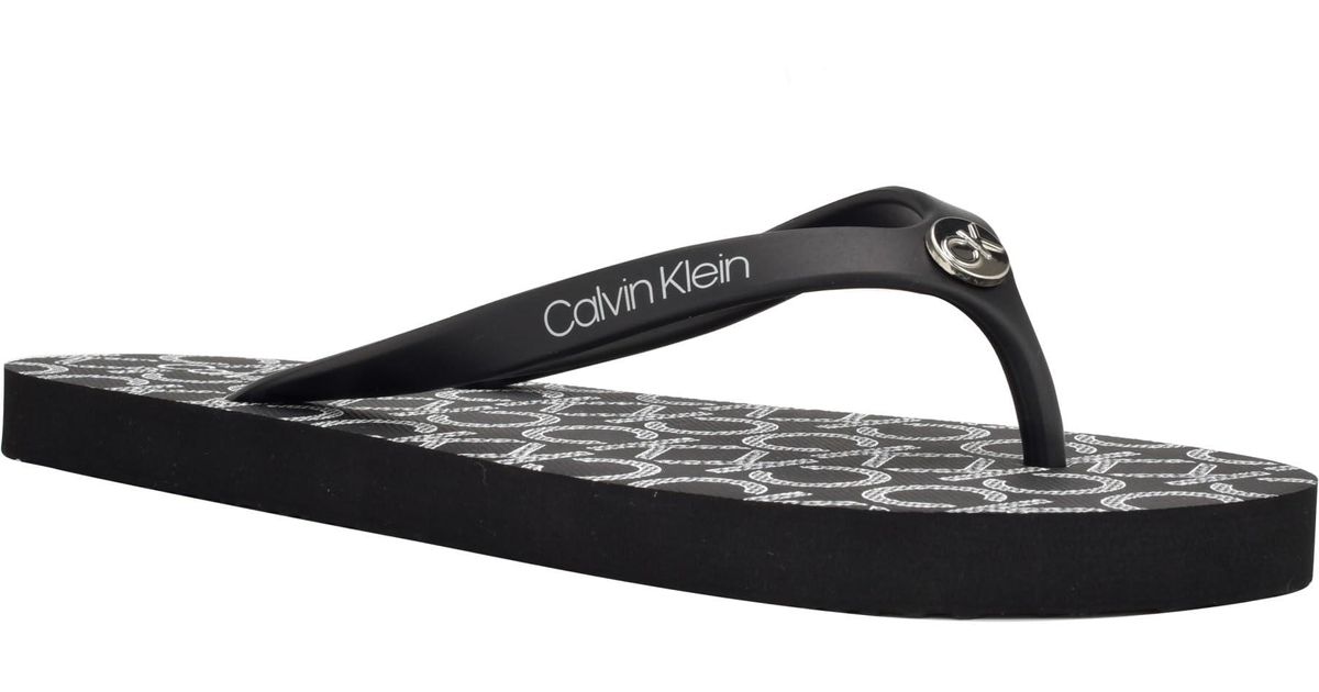 Black calvin klein flip flops hotsell