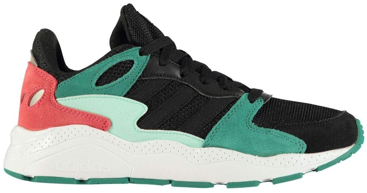 black and green adidas trainers