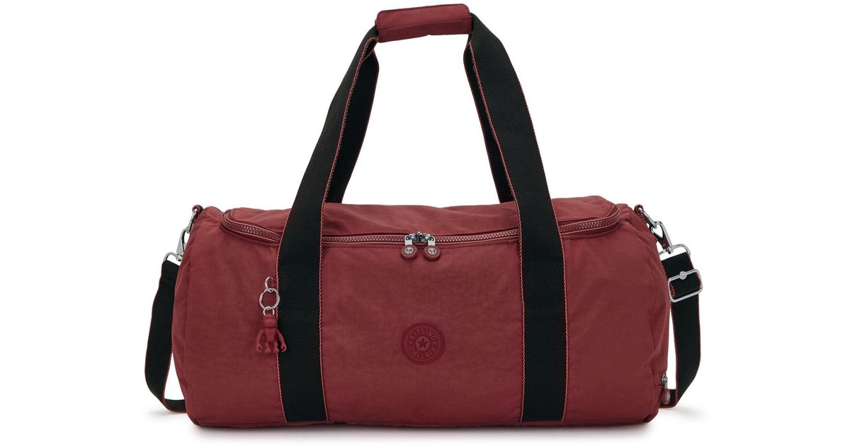 Kipling Argus Small Duffle Flaring Rust in Red Lyst