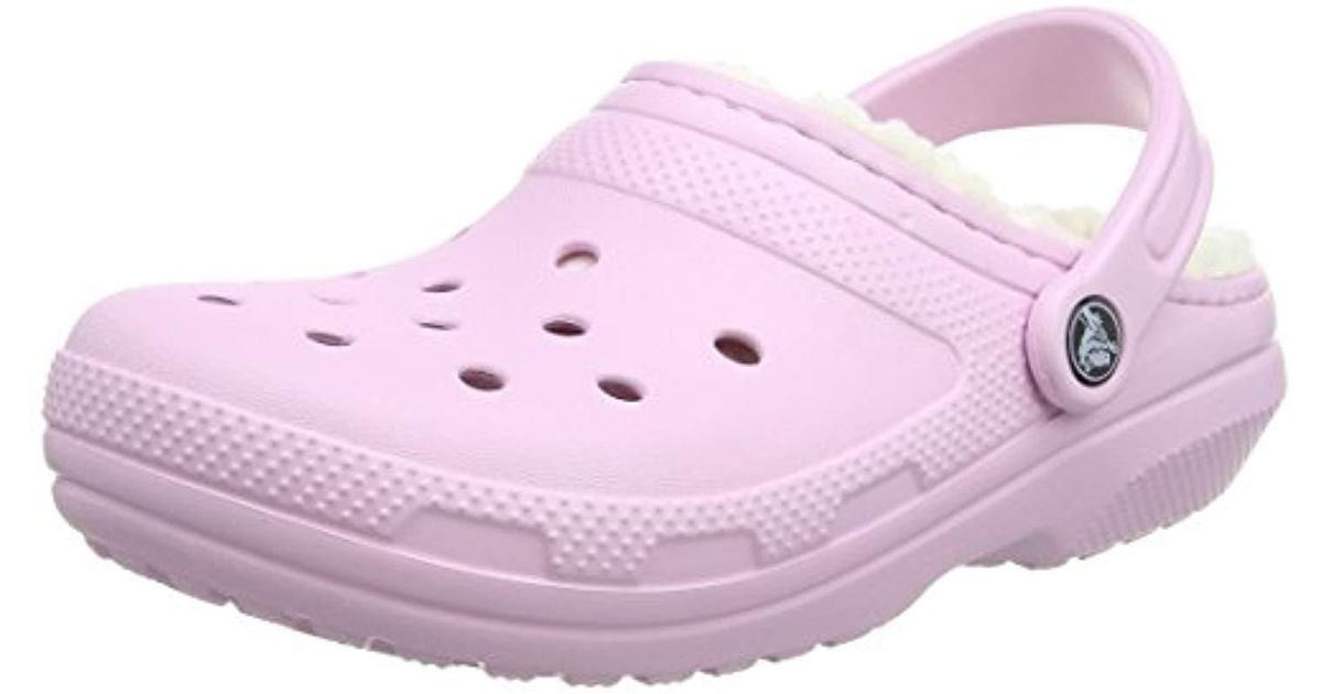 pink crocs with fuzz