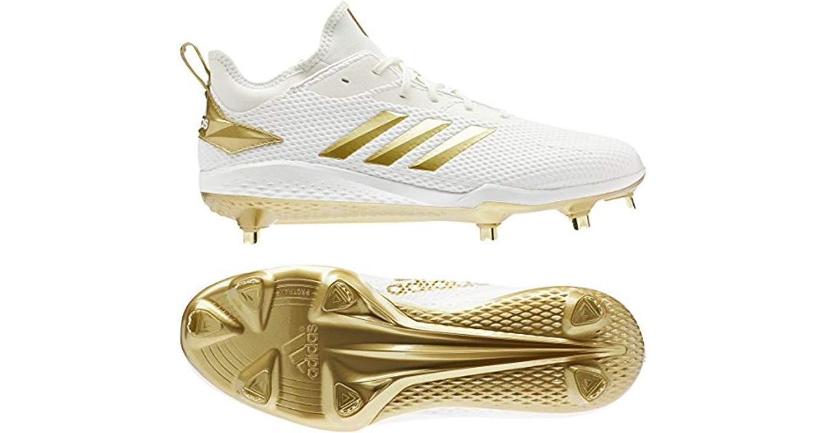 white and gold adidas baseball cleats