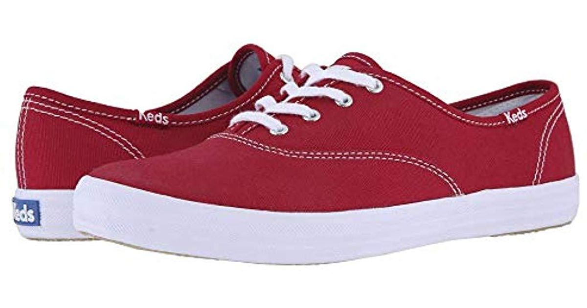red leather keds