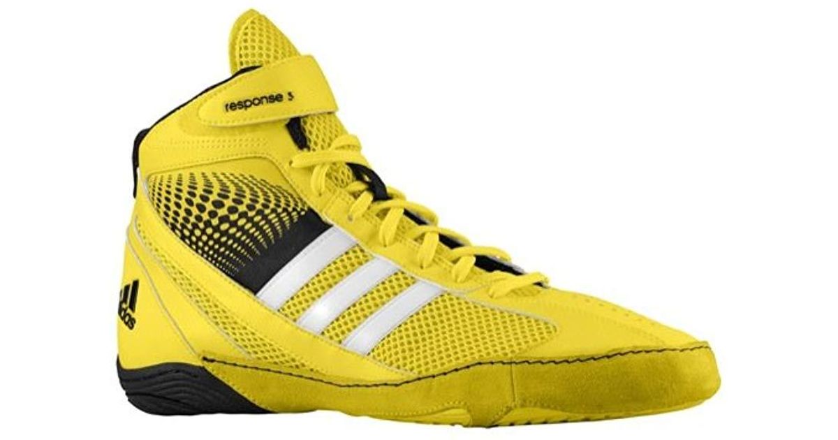black and yellow adidas wrestling shoes