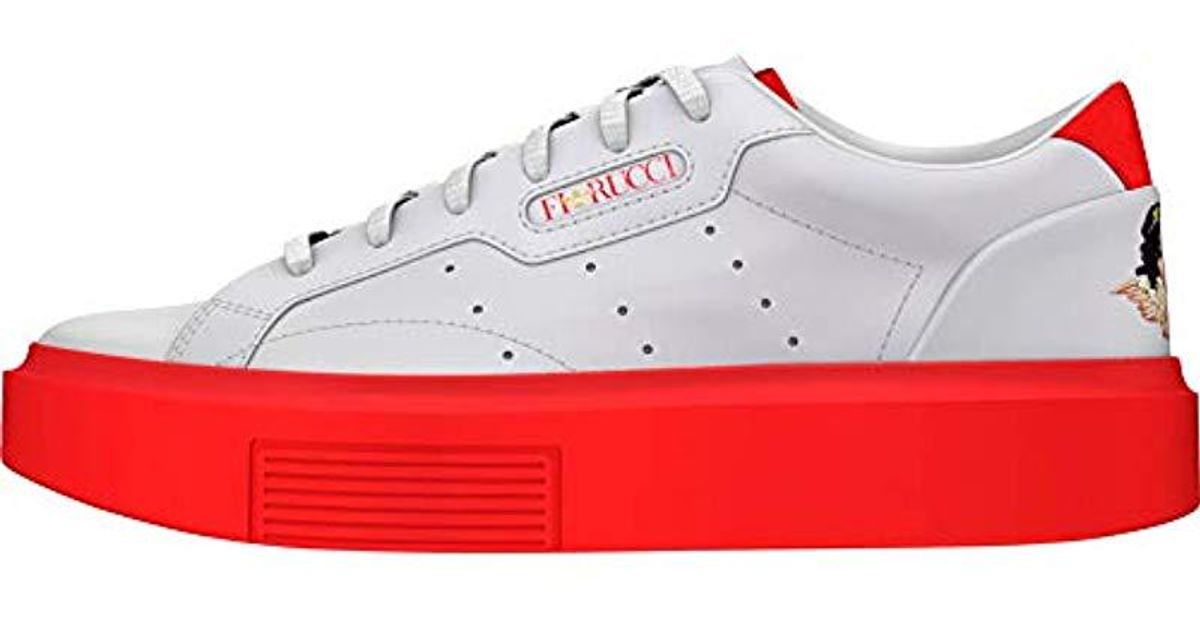 adidas originals x fiorucci super sleek trainers in white and red