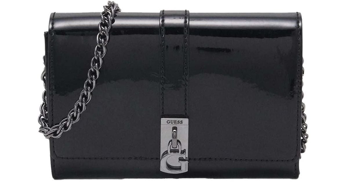 Guess Virtual Mini Black Patent Crossbody Bag Lyst UK