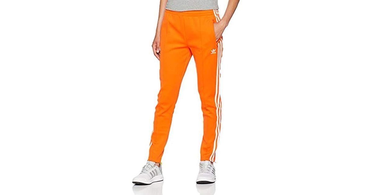 - SST TP - Pantalon - Femme Adidas en coloris Orange