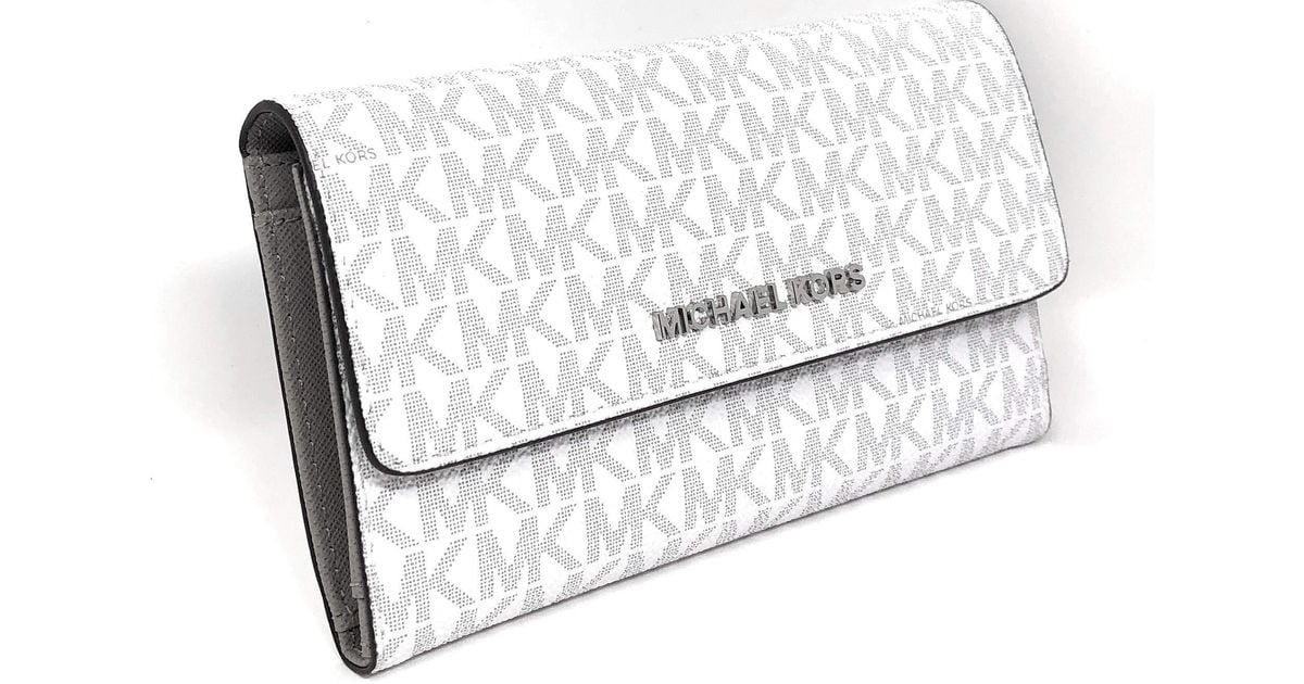 Michael Kors Jet Set Travel Trifold Geldborse Vanilla Acorn Signature 35S8GTVF7L Lyst DE