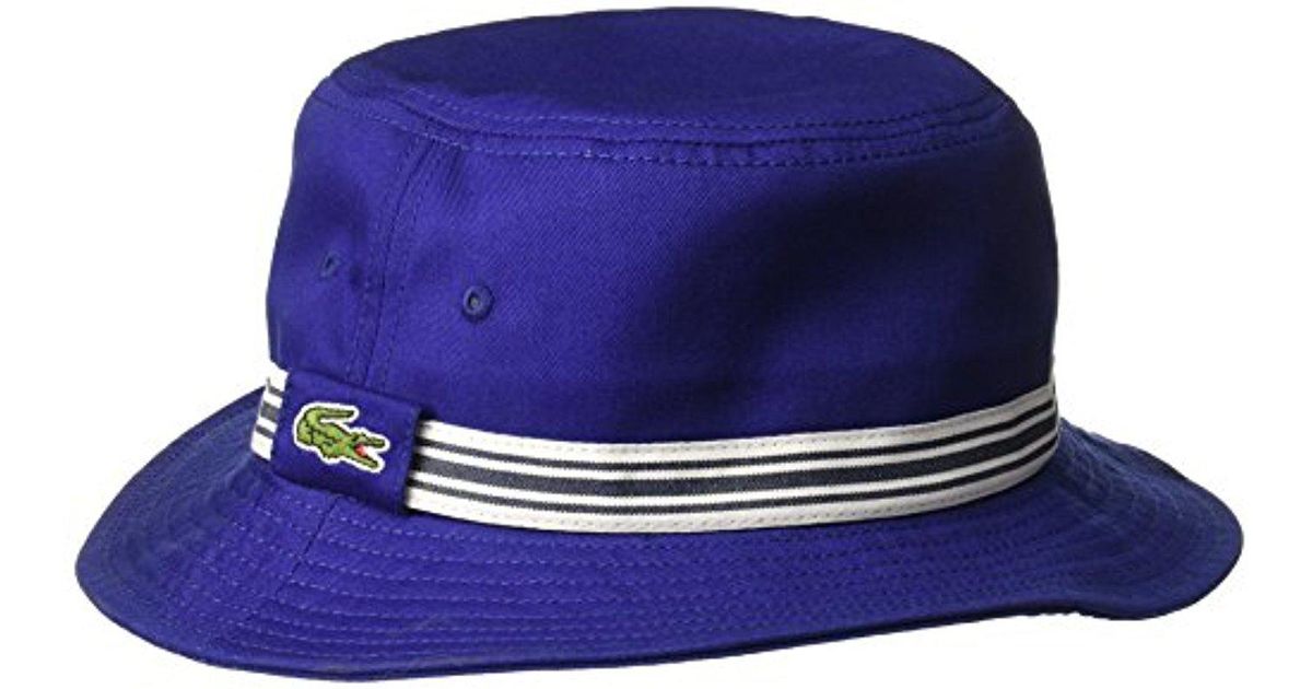 purple lacoste hat