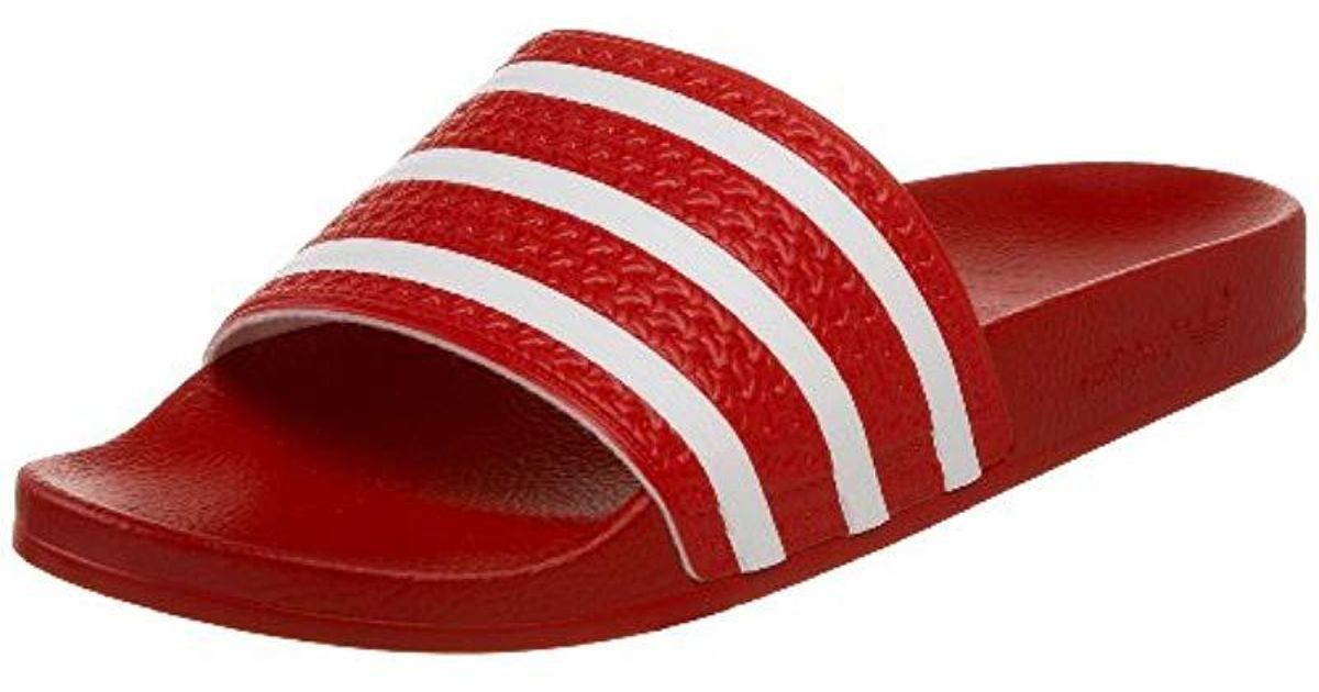 all red adidas slides