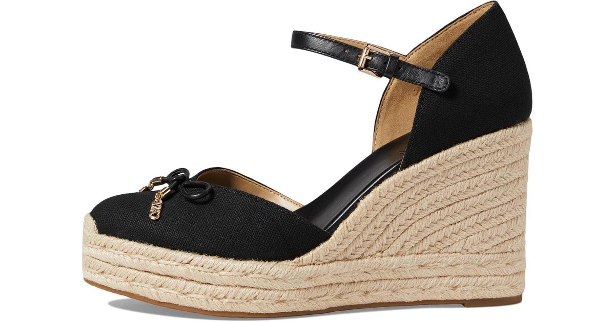 Michael kors hotsell black wedges