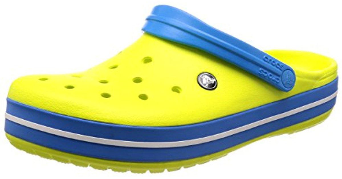 blue and yellow crocs