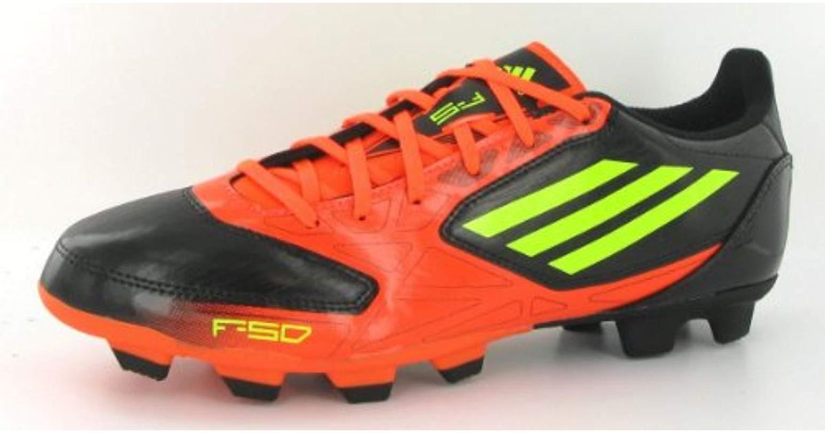adidas black and orange football boots