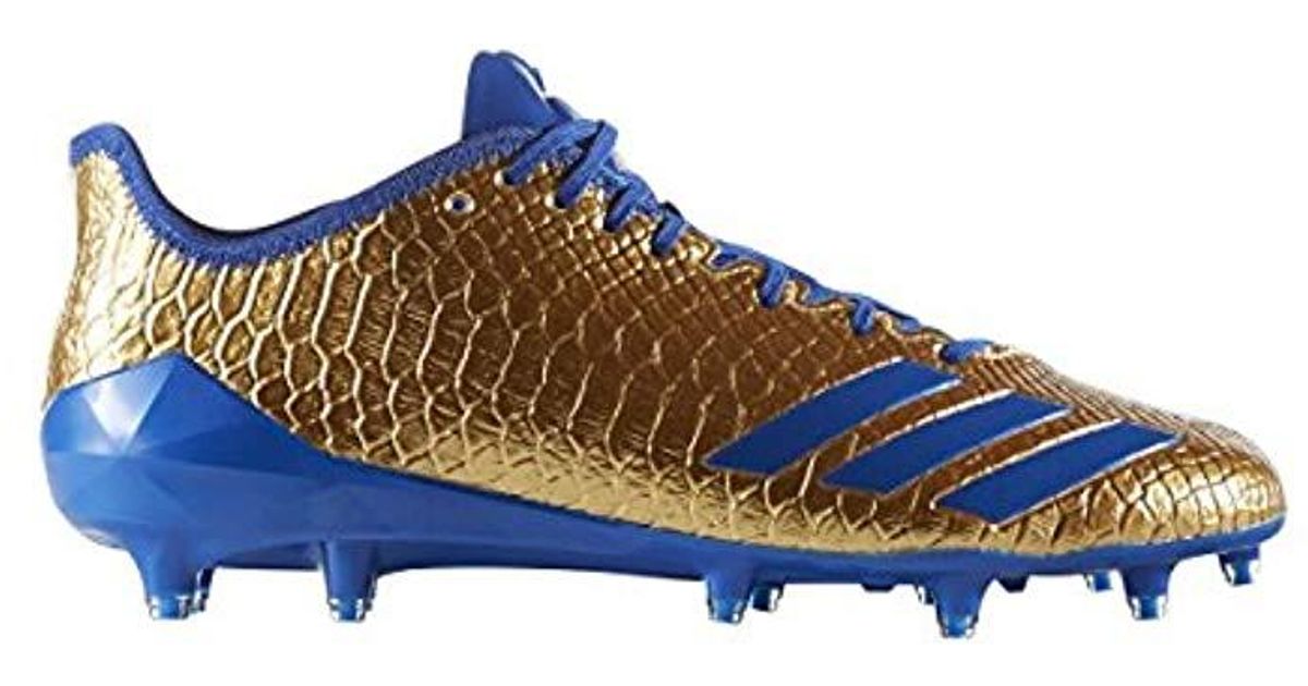 blue and gold adidas cleats