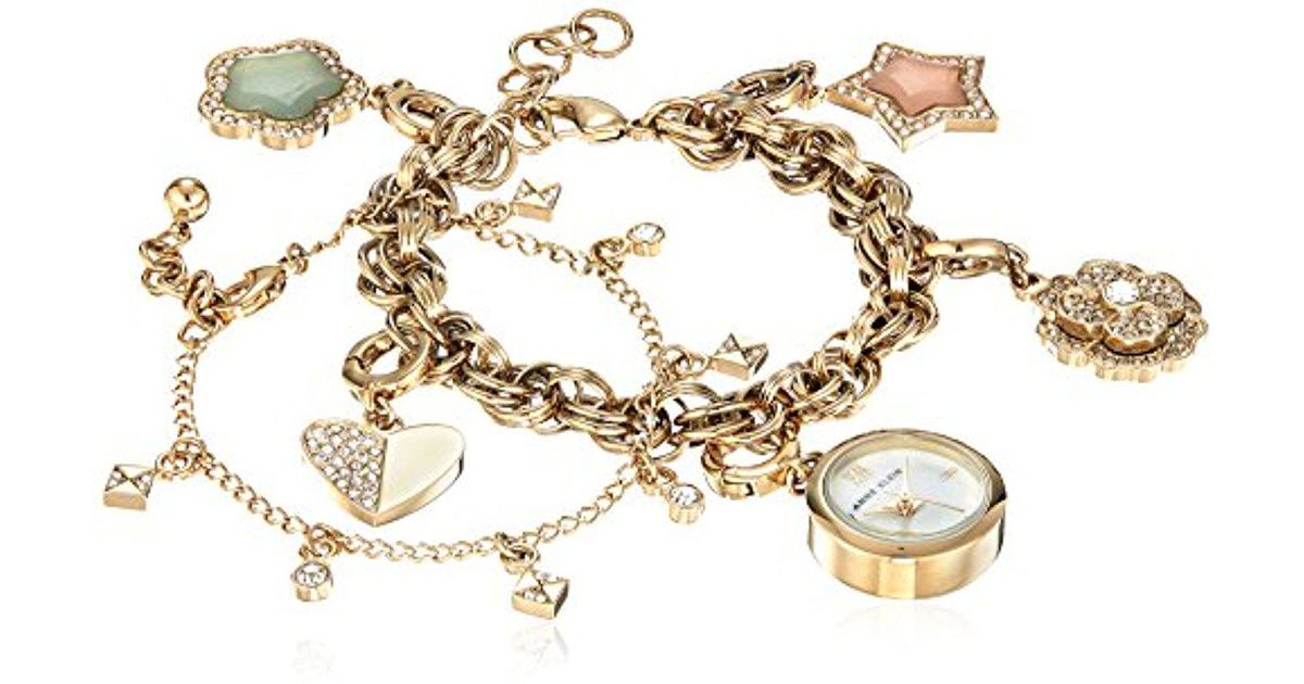 Anne Klein Metallic Ak 3044chst Swarovski Crystal Accented Gold Tone Charm Watch And Bracelet Set Anne Klein Metallic Ak 3044chst Swarovski Crystal Accented Gold Tone Charm Watch And Bracelet Set