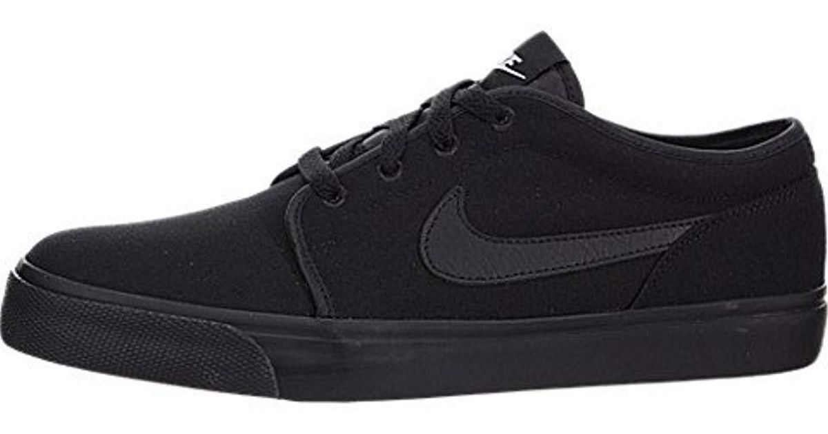 nike toki low txt