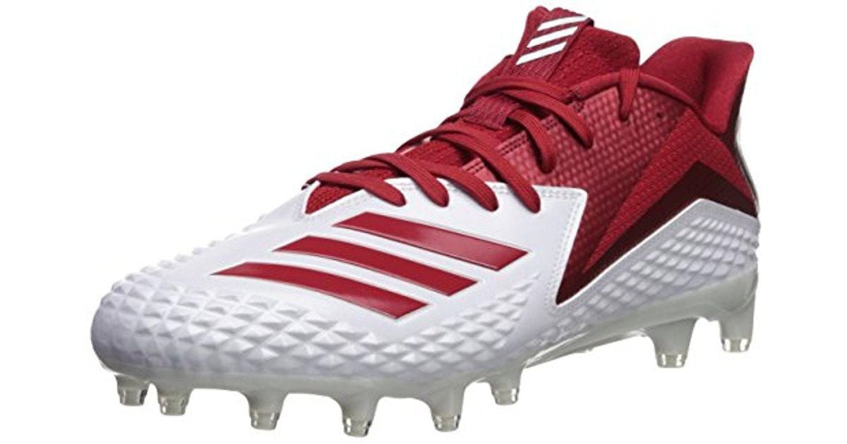 red and white adidas football cleats