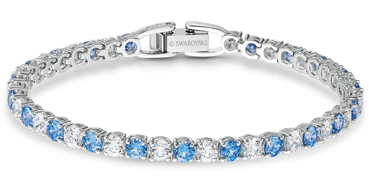 Swarovski 125th Anniversary Tennis Deluxe Bracelet With Light Blue And  White Crystals On A Rhodium Plated Setting | Lyst