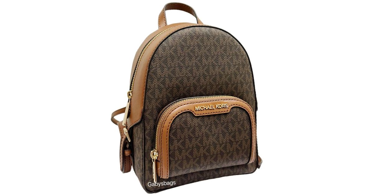 Michael Kors Jaycee Xs Mini Convertible Backpack Mk Signature Crossbody in Brown Lyst UK