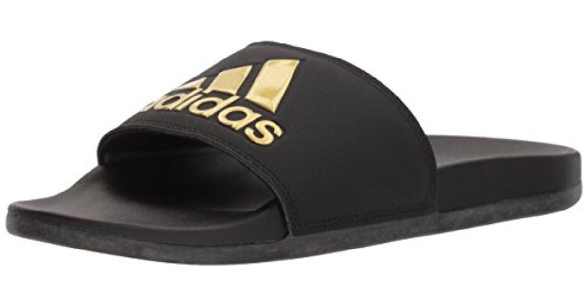 adidas flip flops black and gold