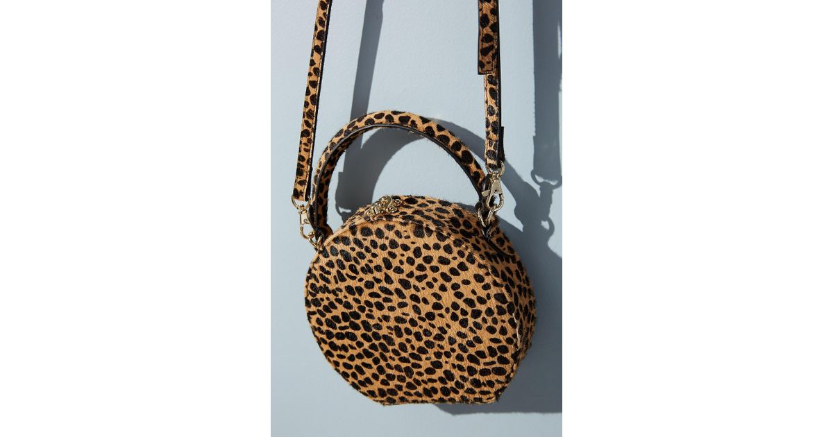 Anthropologie Circular Leopard Print Crossbody Bag In Blue Lyst