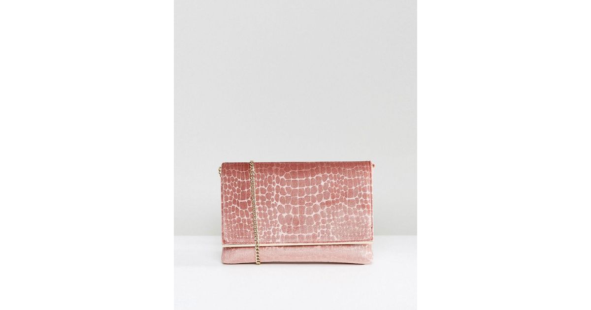 pink velvet clutch